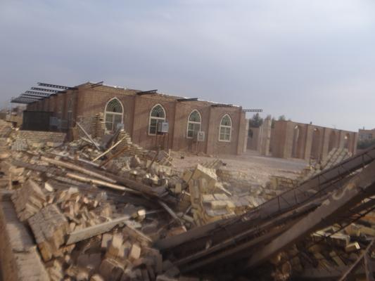 تخريب ساختمان تجاري غير مجاز در بلوار شهيد عابدي 